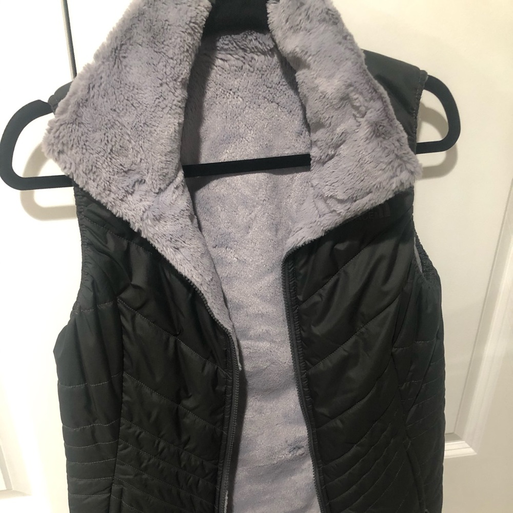 Black and furry reversible North Face Vest